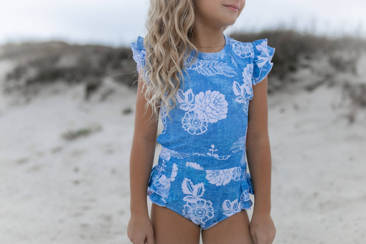 Oopsie Daisy | Blue Floral Open Back One Piece Ruffle Swimsuit
