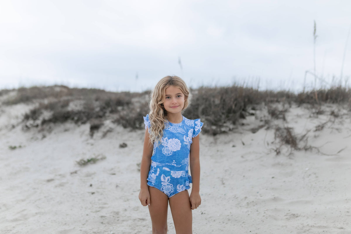 Oopsie Daisy | Blue Floral Open Back One Piece Ruffle Swimsuit