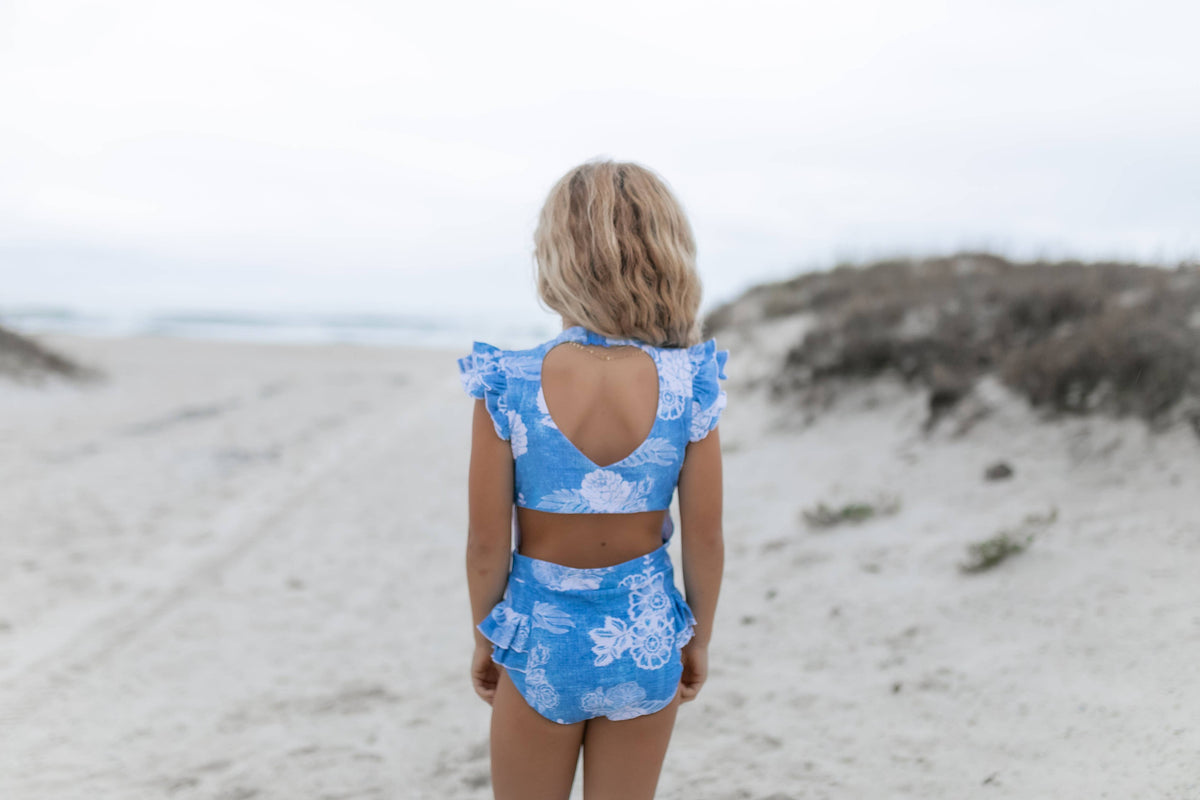 Oopsie Daisy | Blue Floral Open Back One Piece Ruffle Swimsuit
