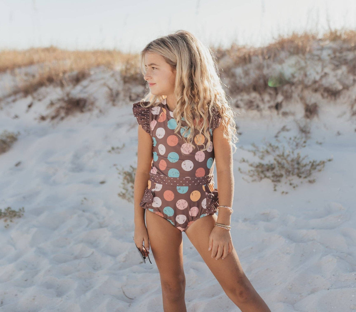 Oopsie Daisy | Chocolate Dot Open Back One Piece Ruffle Swimsuit