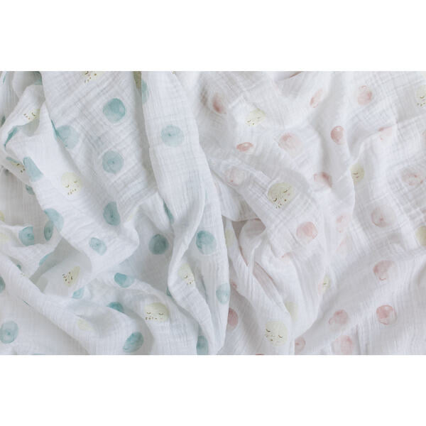 Pehr pink and blue luna dot swaddles thrown together unrolled