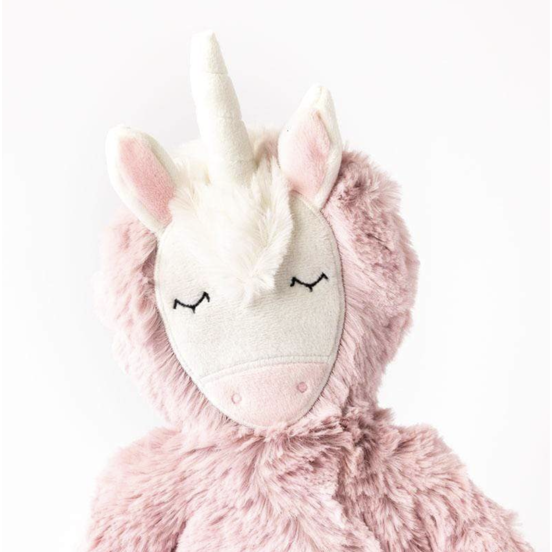 close up of slumberkins pink unicorn head
